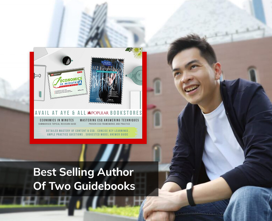 Mr Jeffrey Teo promoting two economics guidebooks with cityscape background