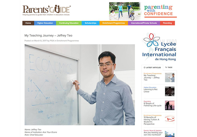 Economics tutor teaching on a whiteboard
