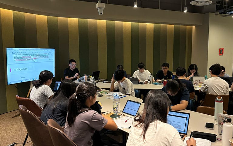 Students studying together in a collaborative workspace